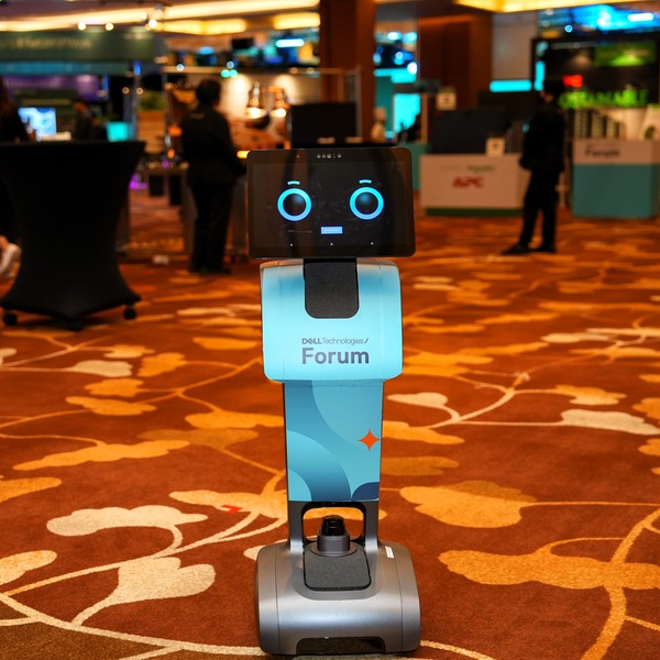 A Dell Technologies Forum-branded robot moves around the event space.